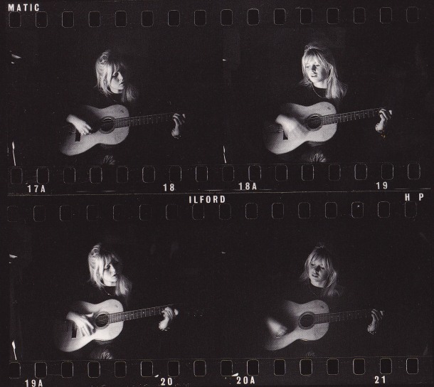 Brigitte Bardot, playing the guitar